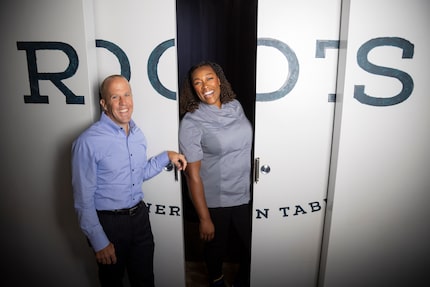 Owners Tom Foley (left) and chef Tiffany Derry pose for a photo at their restaurant, Roots...