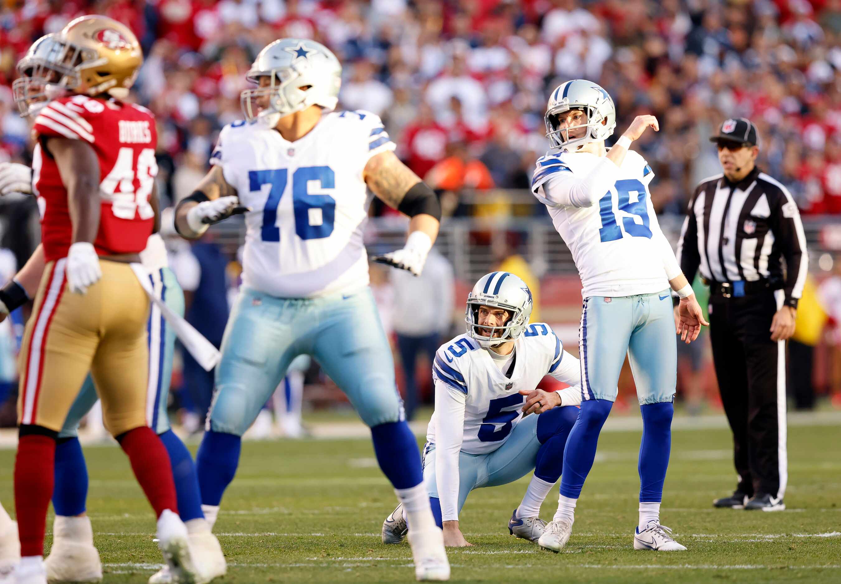 Dallas Cowboys place kicker Brett Maher (19) watches his extra point miss during the second...