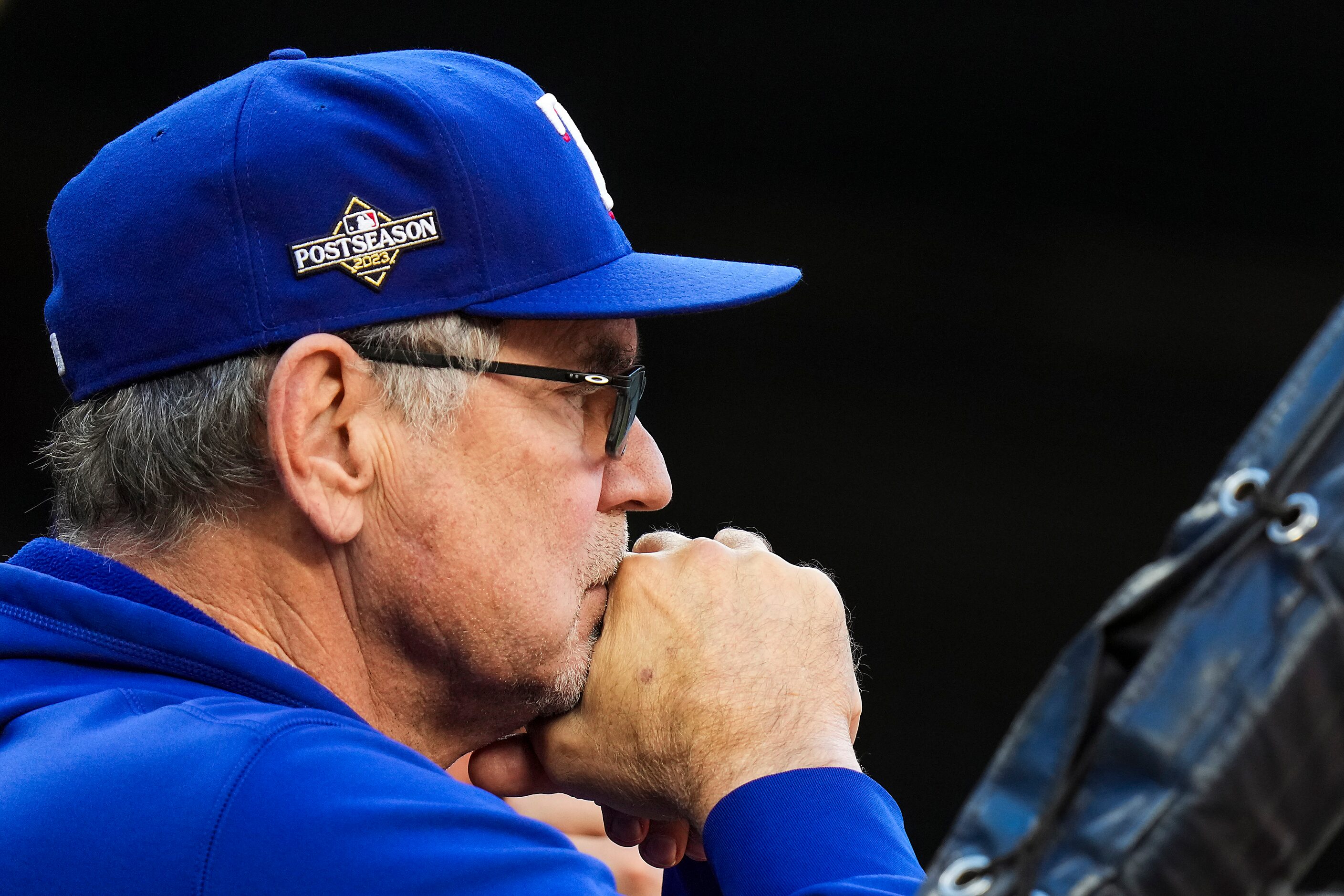 Texas Rangers manager Bruce Bochy watches batting practice during a workout in preparation...