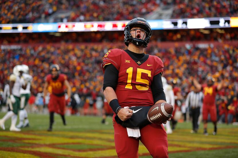 Iowa State quarterback Brock Purdy celebrates his touchdown run during the first half of an...
