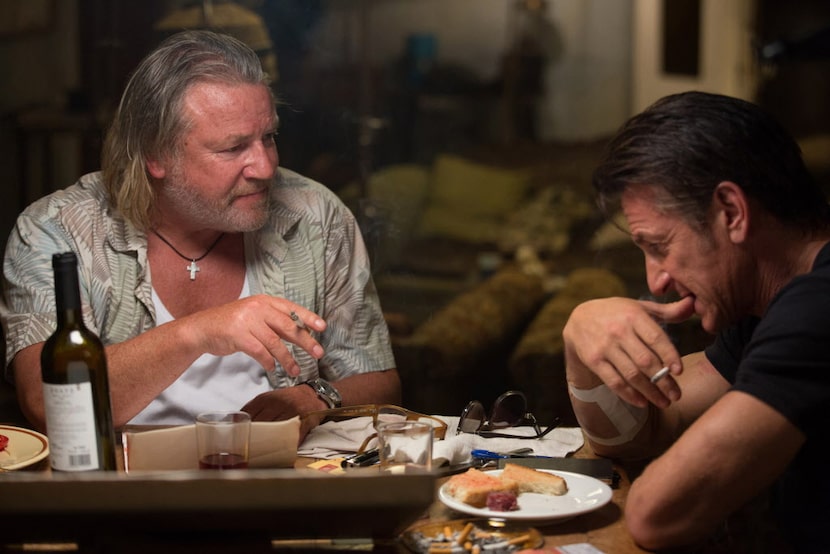 Ray Winstone as Stanley, left,  and Sean Penn as Jim Terrier in "The Gunman."