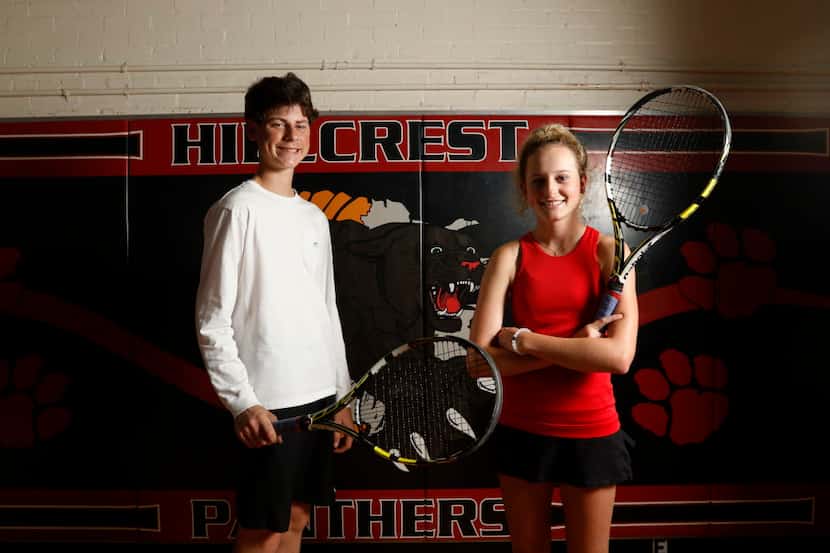 Tennis players junior Zane Kohrs and sophomore Anne Gilliam pose for a photograph at...
