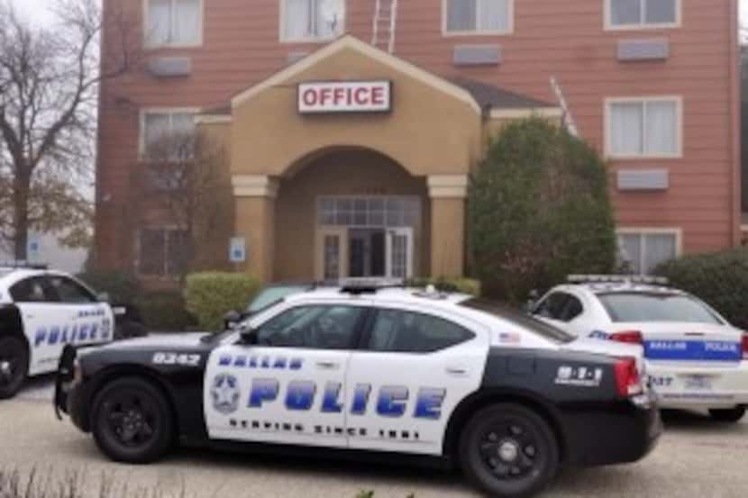  Dallas Police investigate a double shooting at a hotel at 10326 Finnell Street near...