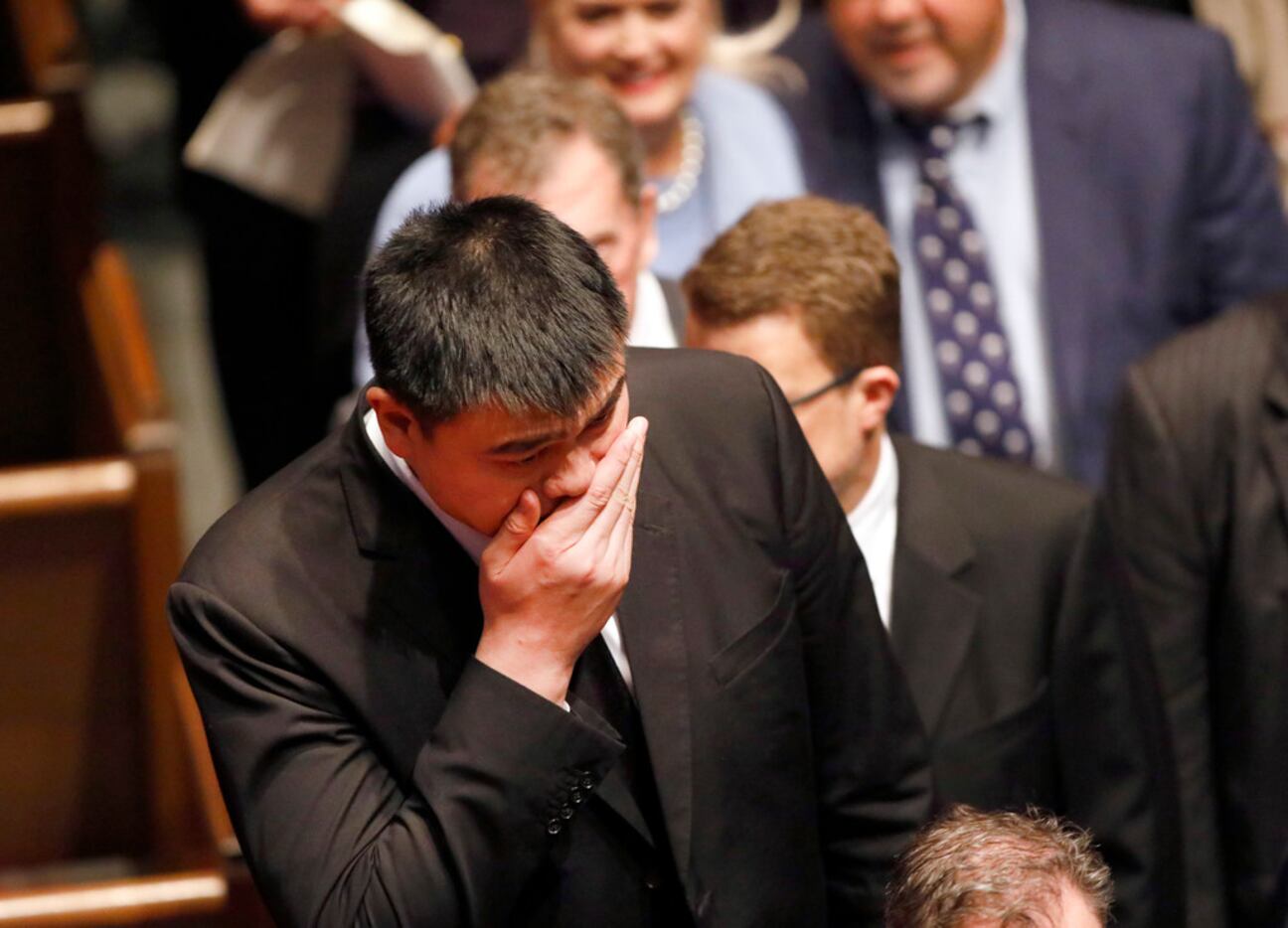 Former Houston Rockets center Yao Ming leaves the funeral service for George H.W. Bush.