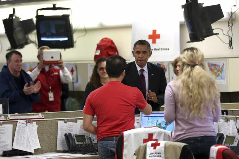 President Barack Obama made a visit to Red Cross headquarters in Washington, D.C., as he...