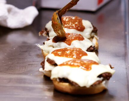 Bizzy Burger serves small-sized burgers that can come stacked with one, two or three patties.