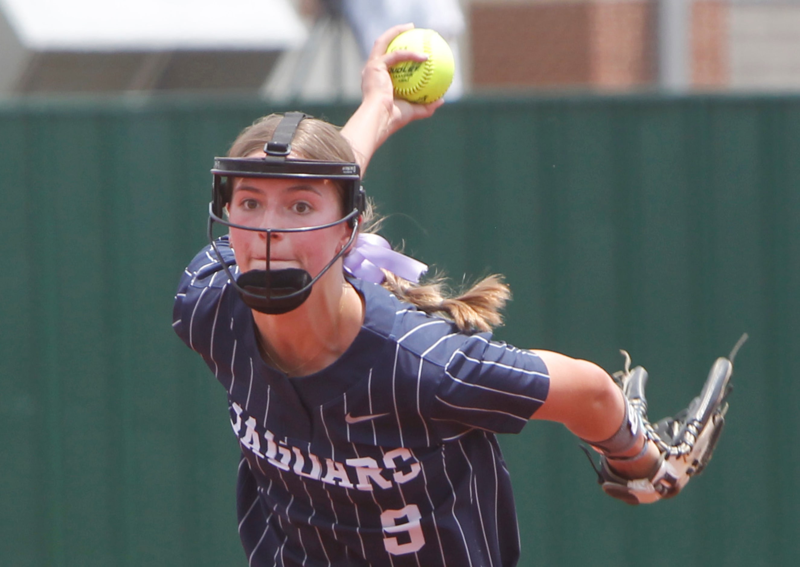 Flower Mound pitcher Abigail Jennings (9) delivers a pitch to a Keller batter during the top...