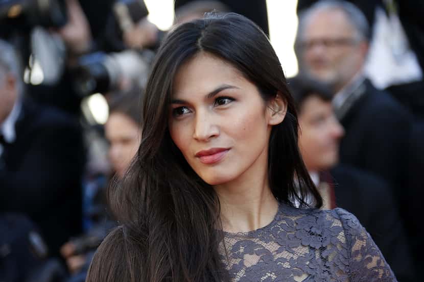 French actress Elodie Yung poses on May 17, 2013 as she arrives for the screening of the...