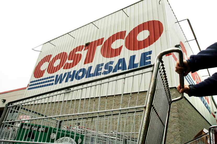 Costco's fiscal second-quarter net income fell 15 percent, hurt by softer sales of some...