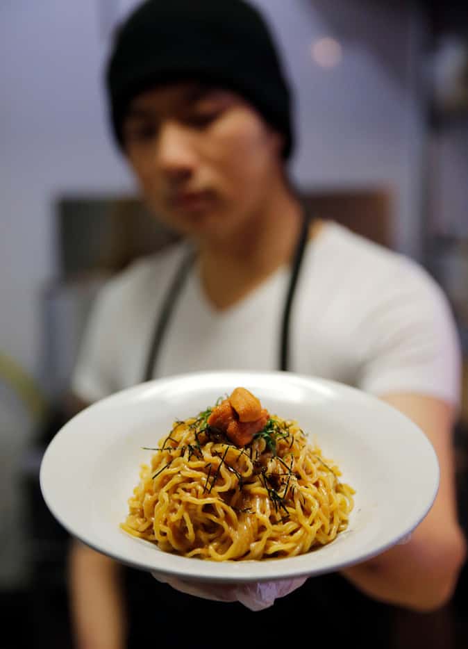 Chef Andy Tam with an off-menu special: mentaiko mazemen ramen with uni at Ichigoh Ramen Lounge