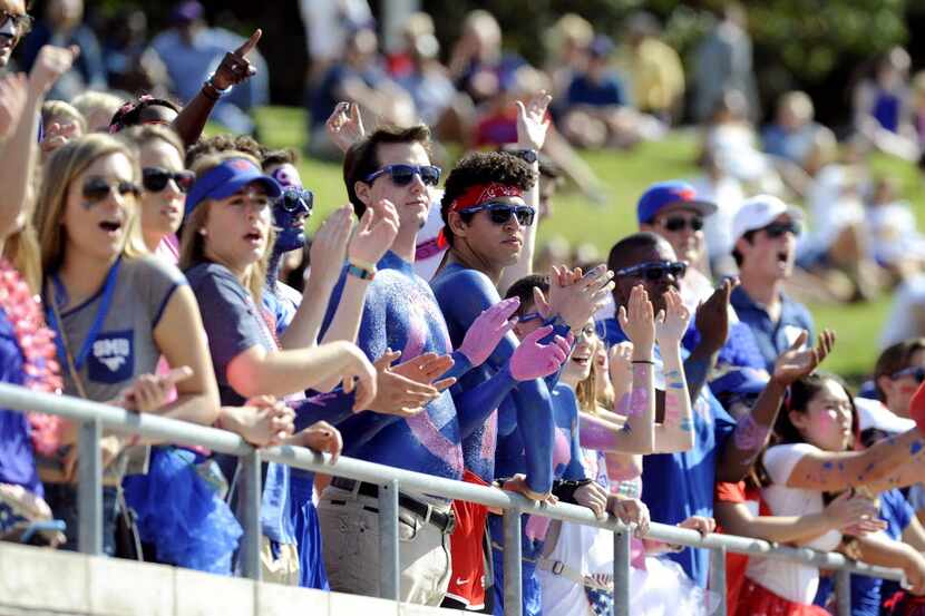 SMU Mustangs fans cheer on their team in the second quarter during an NCAA football game...