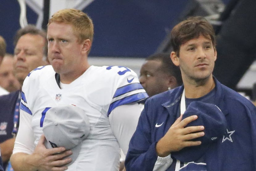 Dallas Cowboys quarterbacks Brandon Weeden (3) and Tony Romo (9) stand together during the...