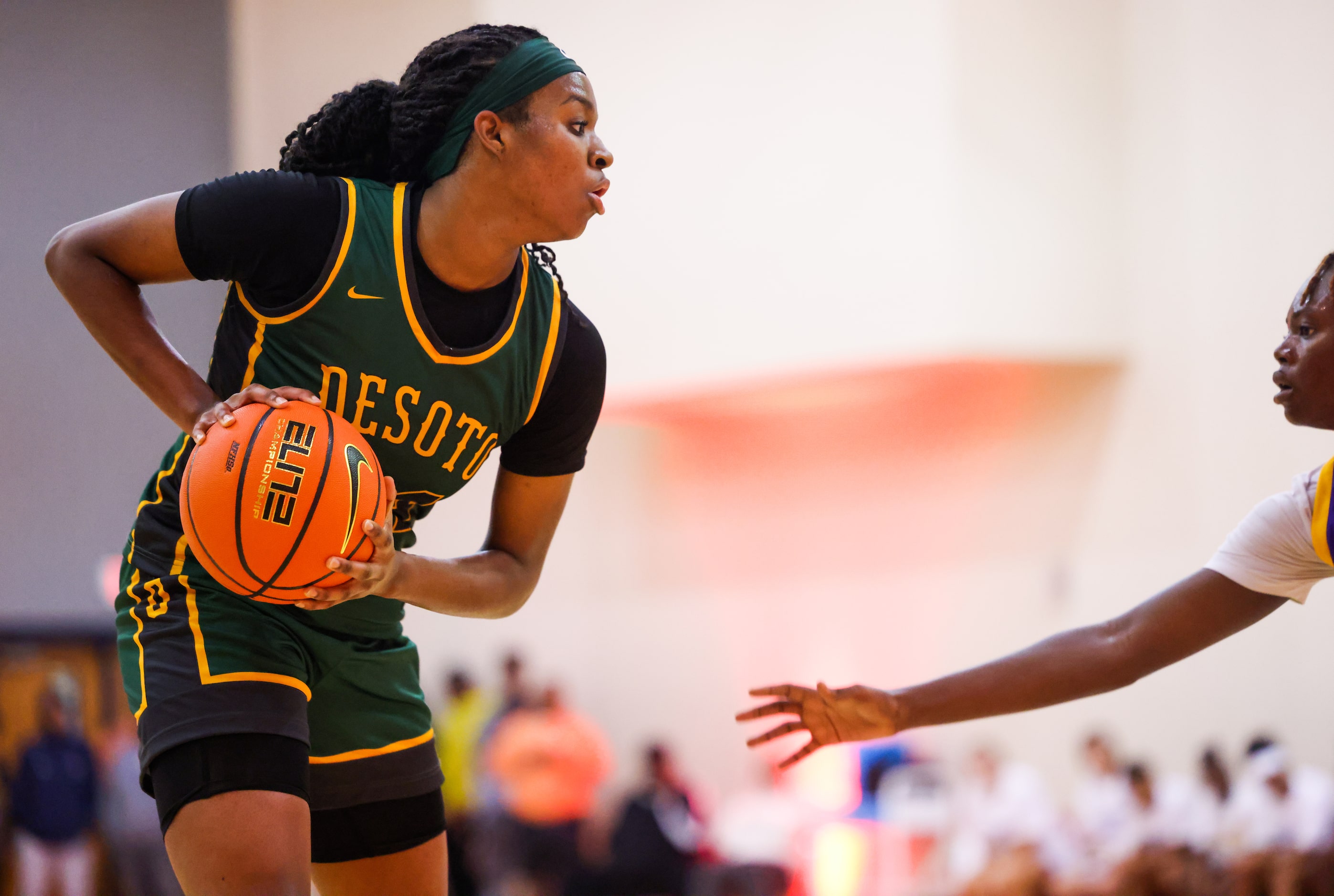 DeSoto small forward Amari Byles (24) prepares a pass during a game against Montverde...