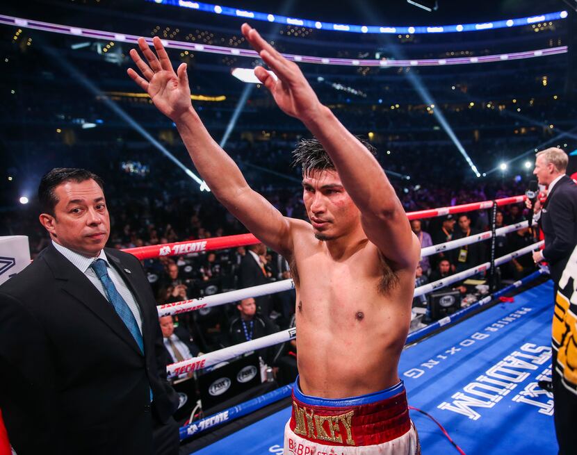 Mikey Garcia waves to fans following his defeat to Errol Spence Jr. in a IBF World...