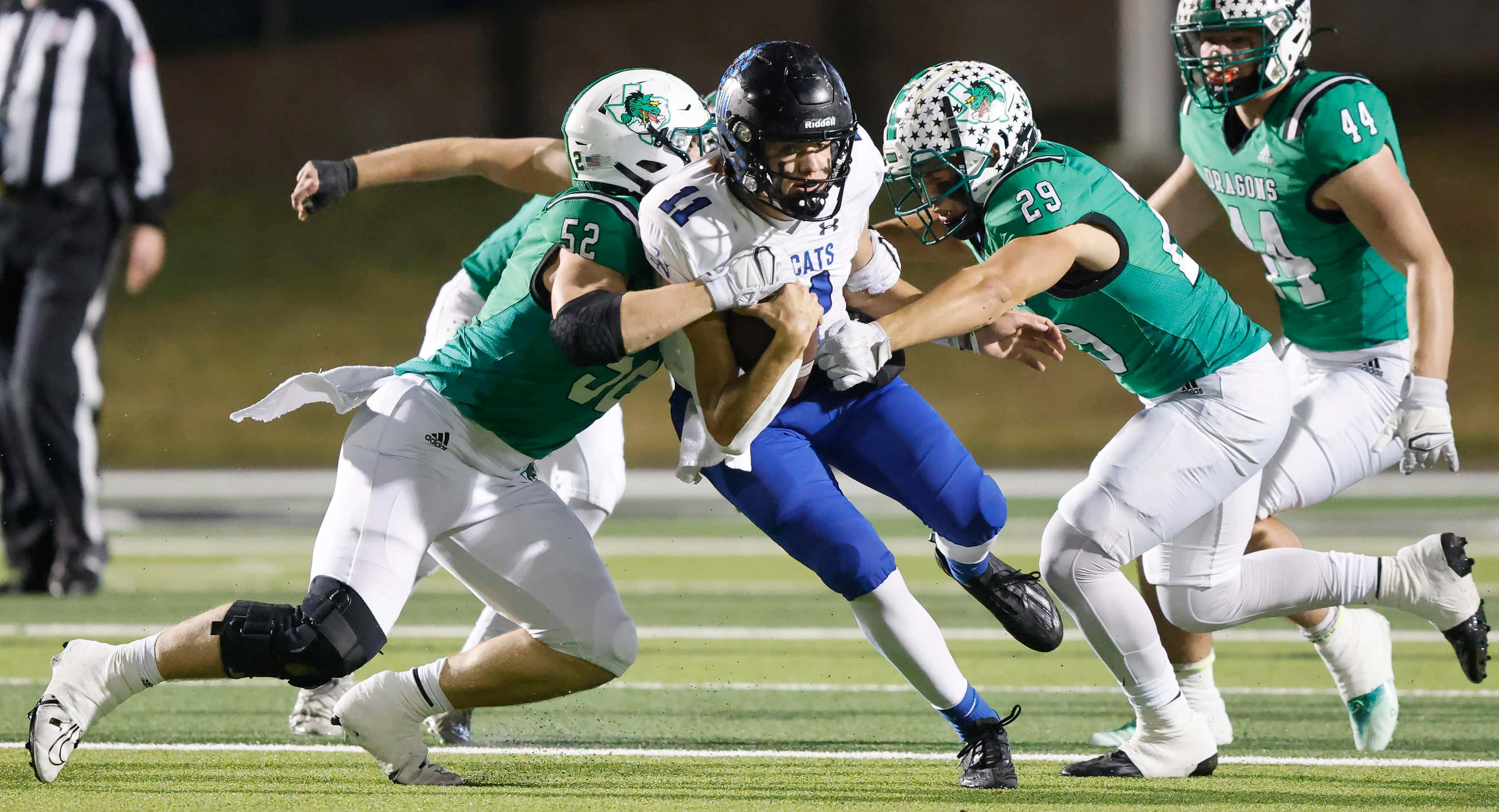 Southlake Carroll Cade Prks (52) and Nigel Fodor (29 combine to stop Byron Nelson Jake...