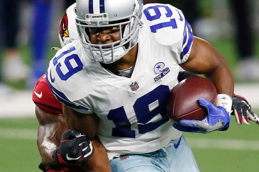 "4 Dak," can be seen on the tape of Dallas Cowboys wide receiver Amari Cooper (19) as he is...