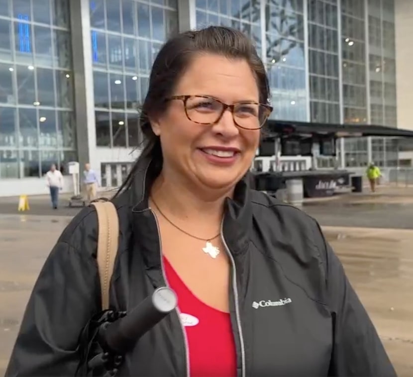 Dallas Richard, 38, of Arlington, was the first person to vote Tuesday at AT&T Stadium.