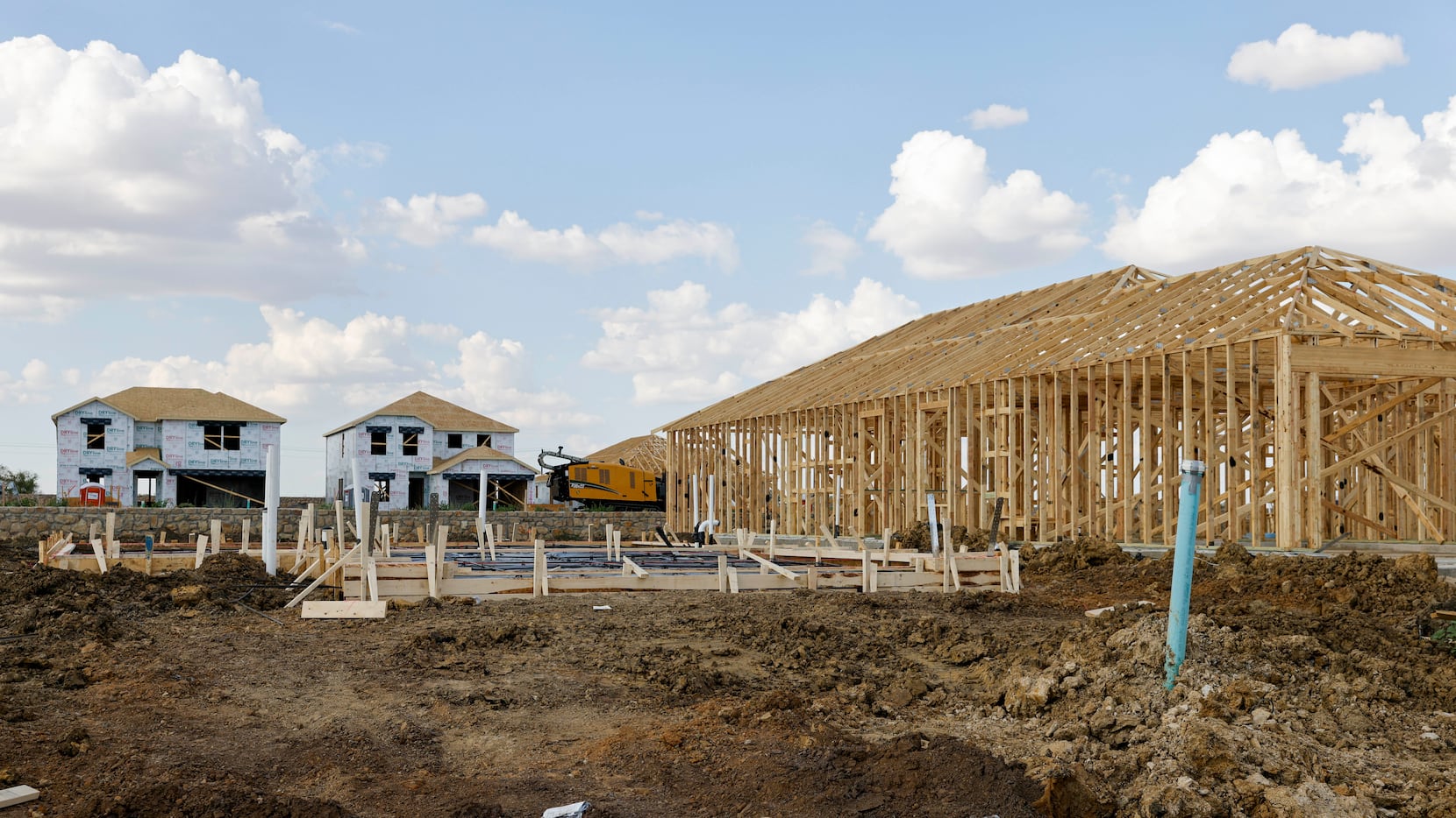 Houses under construction at the Mobberly Farms development in Pilot Point.