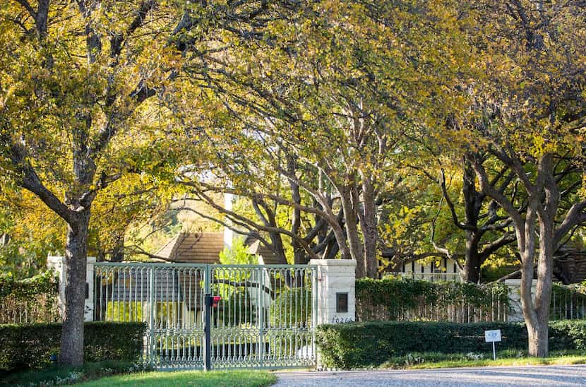 
The residence of Dennis Topletz is behind the gates on Inwood Road in Preston Hollow. The...