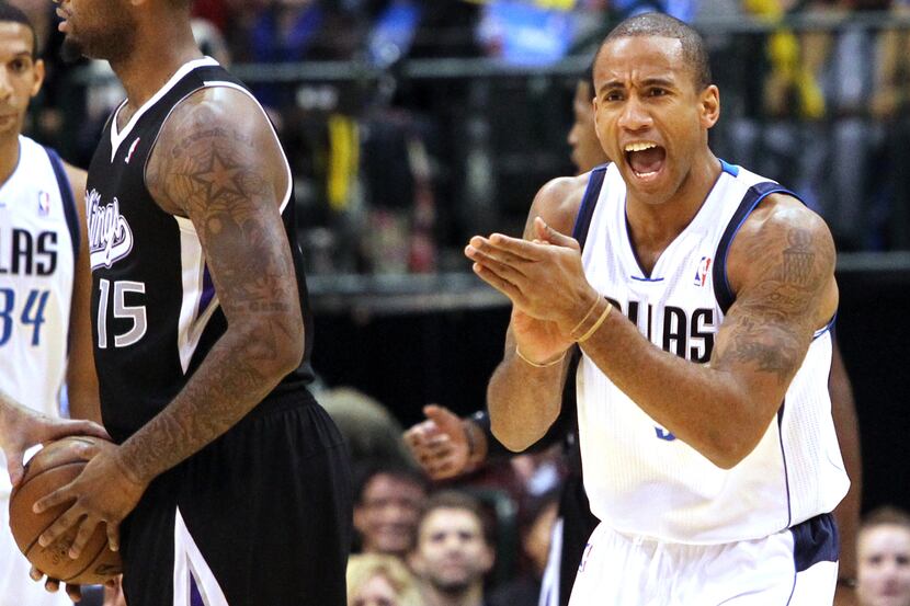 Dallas' Dahntay Jones (30) is pleased with his team's effort in the first quarter during the...