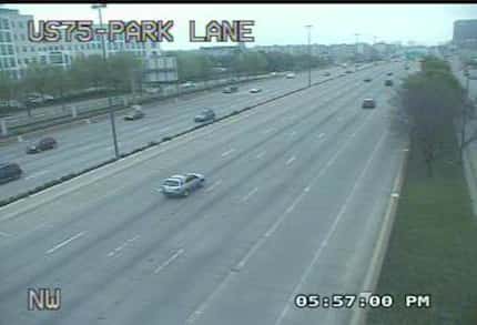 Traffic zipped by Park Lane in Dallas on North Central Expressway on Tuesday evening.