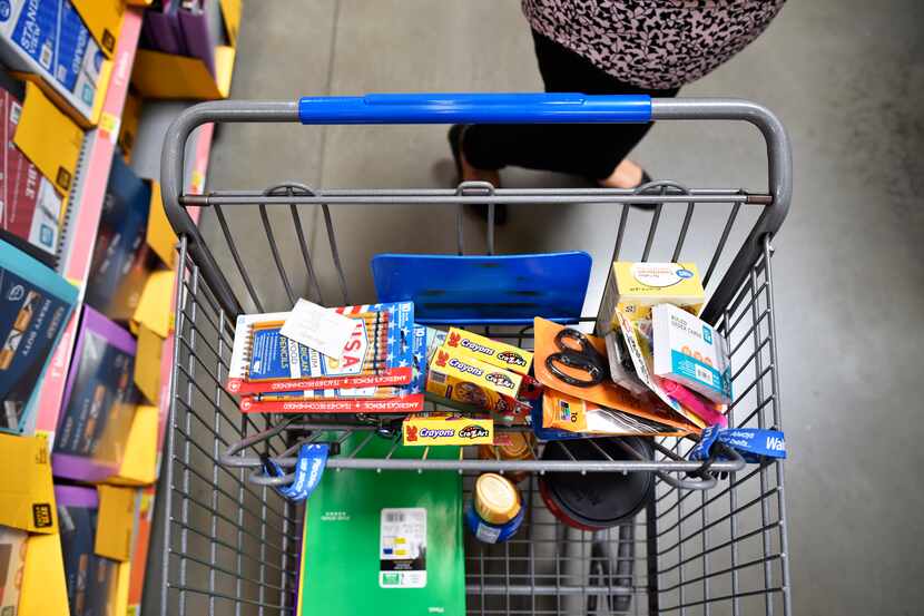 Reyna Jimenez, 30, of Farmers Branch, shopped for school supplies a  Walmart Supercenter off...