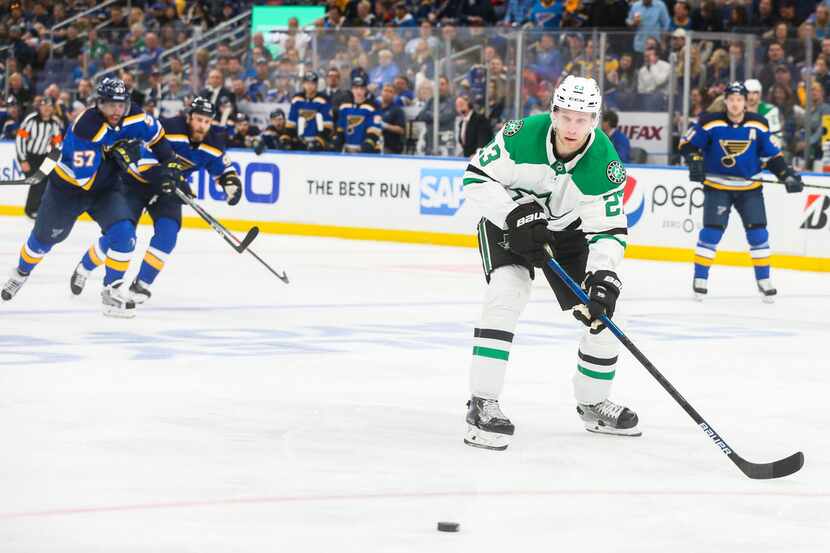 Dallas Stars defenseman Esa Lindell (23) makes a pass during g game 1 of an NHL second-round...