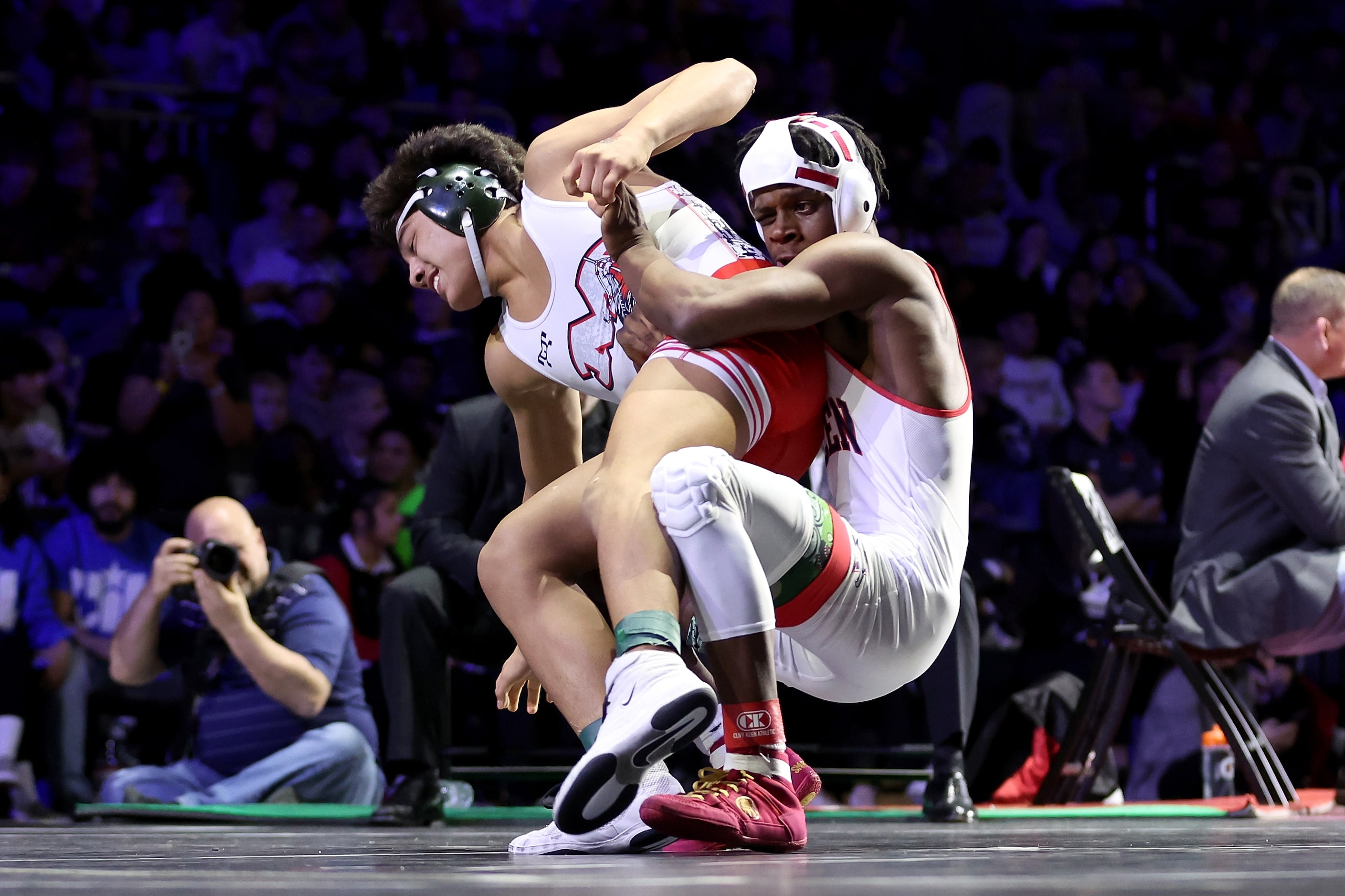 Javin Jackson-Bey (white) of Allen competes against Nicholas Zamora of Arlington Martin in...