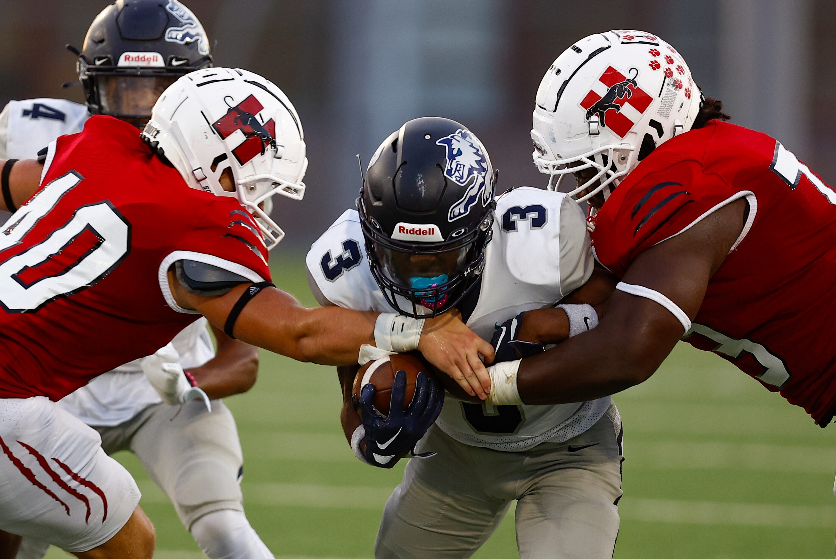 Carrollton Ranchview senior wide receiver Dejan Adams (3) battles Hillcrest sophomore...