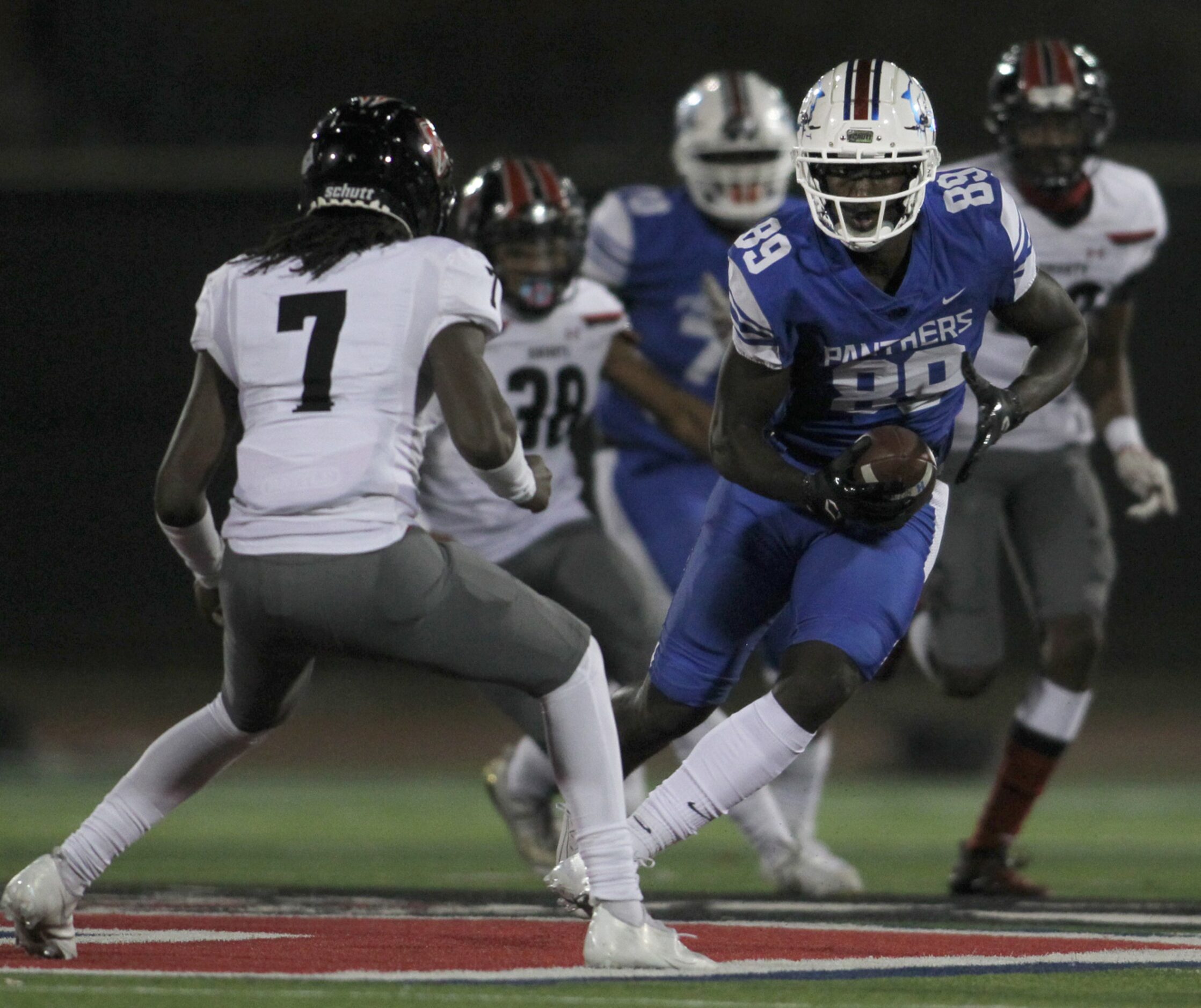 Duncanville receiver Jerrale Powers (89) eyes Killeen Harker Heights defensive back...