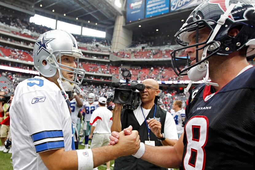 Dallas Cowboys quarterback Tony Romo (9) shakes hands with Houston Texans quarterback Matt...