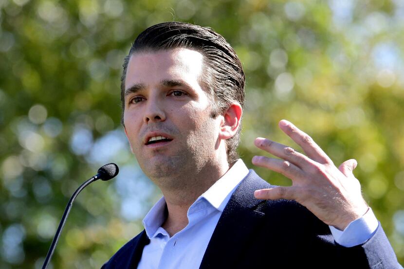 FILE - In this Nov. 4, 2016, file photo, Donald Trump Jr. campaigns for his father...