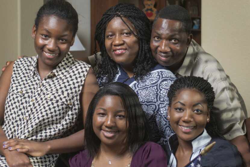 The Obamehintis -- Feyi and Johnson with daughters (from right) Lola, Layo and Lade -- have...