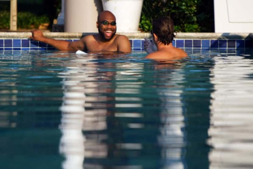  I love this photo of Dirk Ebel giving Donovan Lewis swim lessons.