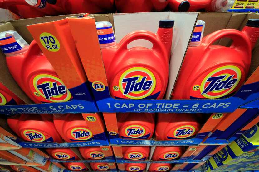 FILE - In this Tuesday, Jan. 21, 2014, file photo, Tide detergent is displayed at a Costco...