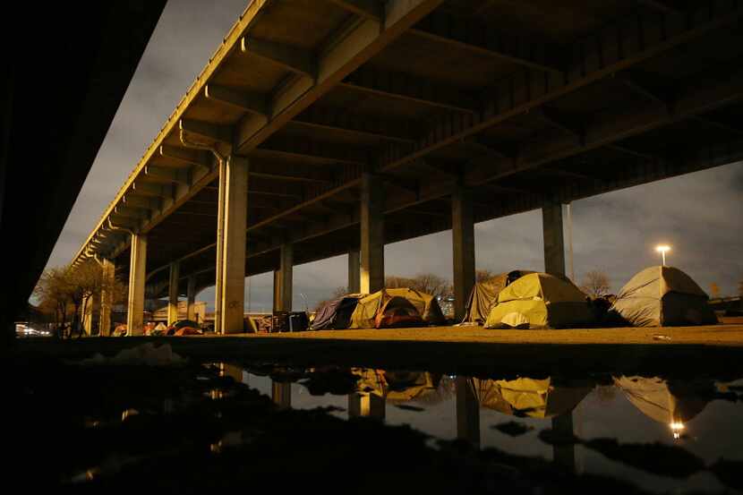 A sprawling homeless encampment under Interstate 45 near downtown Dallas, once home to...