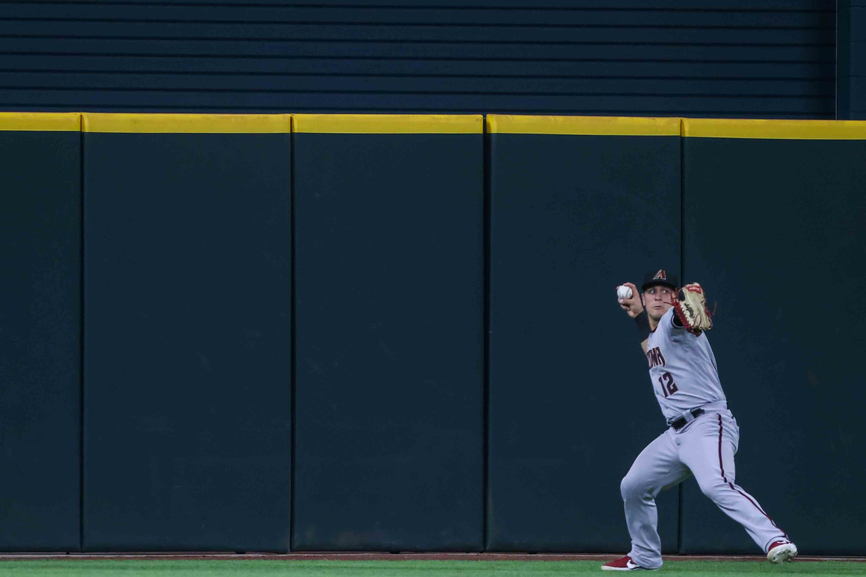 Daulton Varsho (12) catches a fly during Arizona Diamondbacks at Texas Rangers game at the...