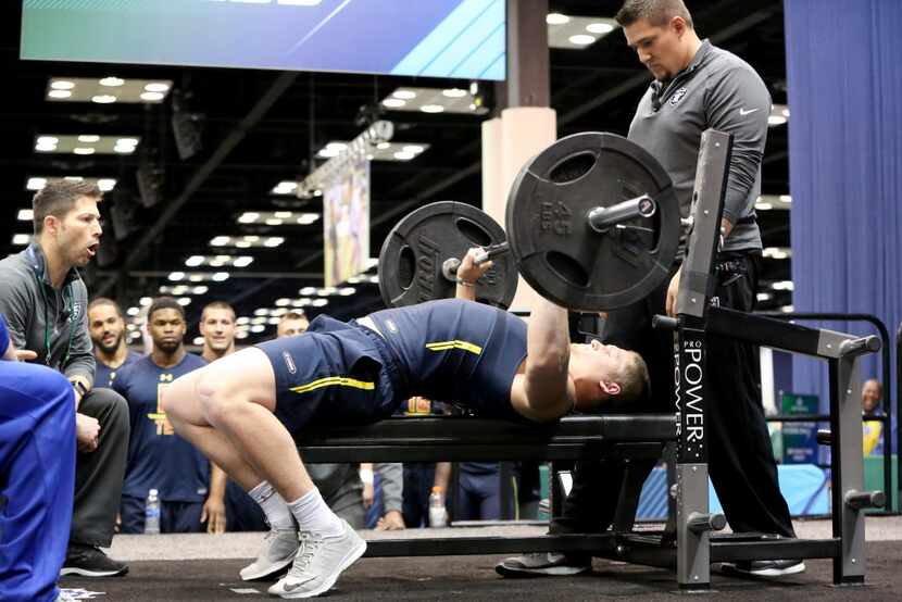 Ashland tight end Adam Shaheen performs the bench press at the 2017 NFL football scouting...