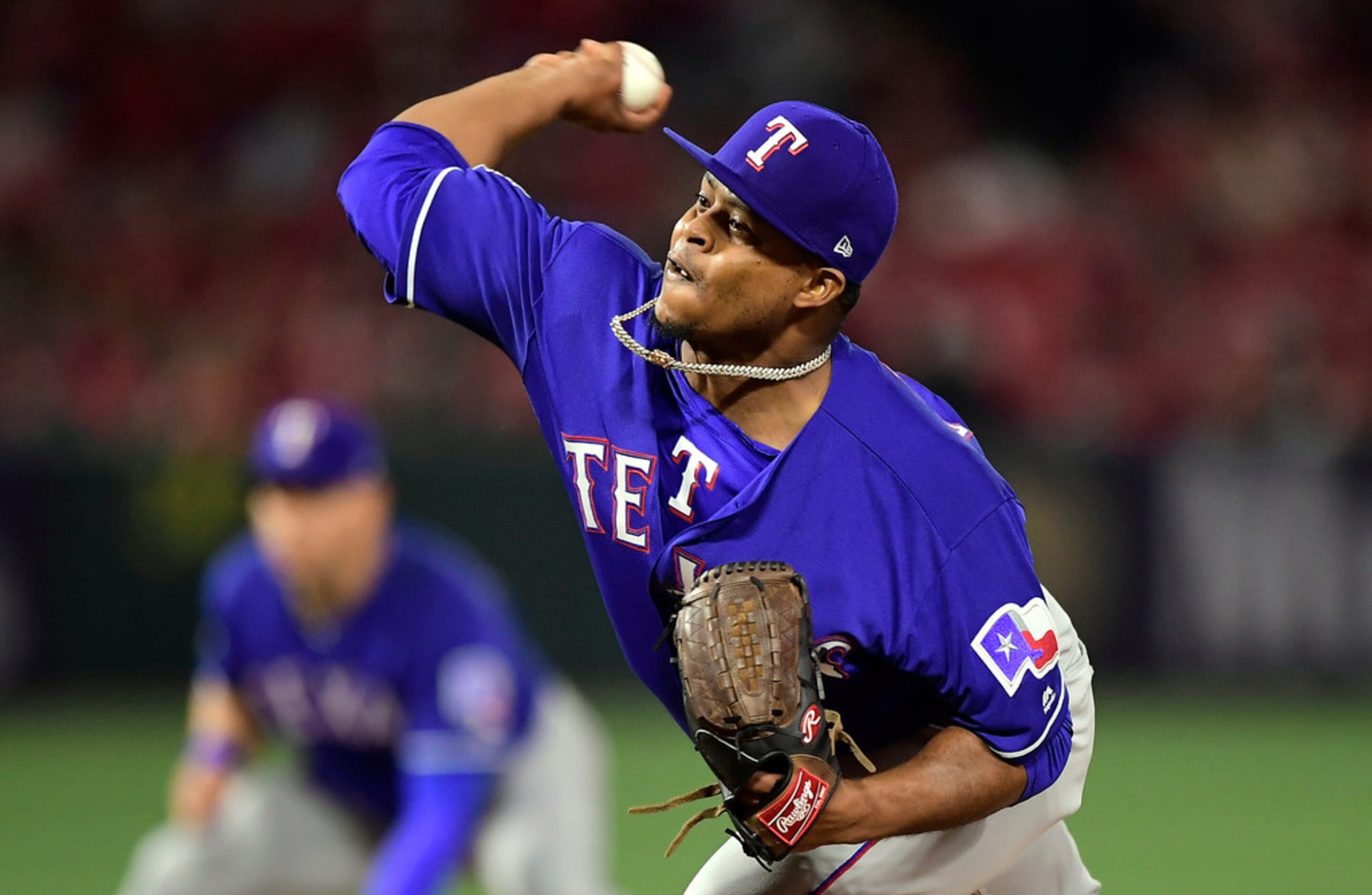 Texas Rangers starting pitcher Edinson Volquez throws during the first inning of the team's...