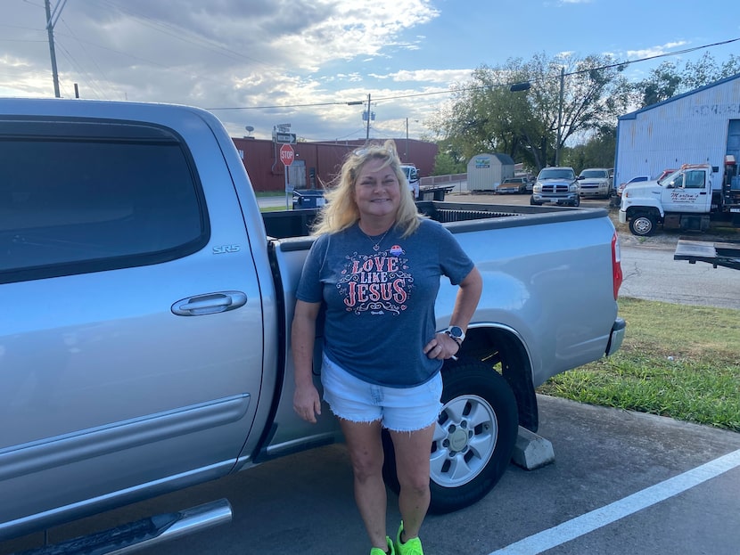 Carrie Cockerham, 51, poses outside Waxahachie polling center on Nov. 5, 2024.