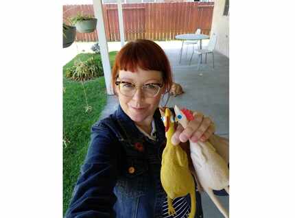 This photo shows Melissa Jean Footlick, 42, of San Diego, with rubber chickens from a game...