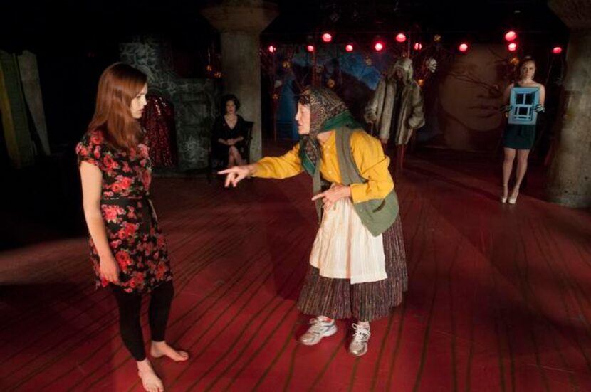 
Katherine Bourne (Annie, the American), left, and Gail Cronauer (Baba Yaga) perform a scene...