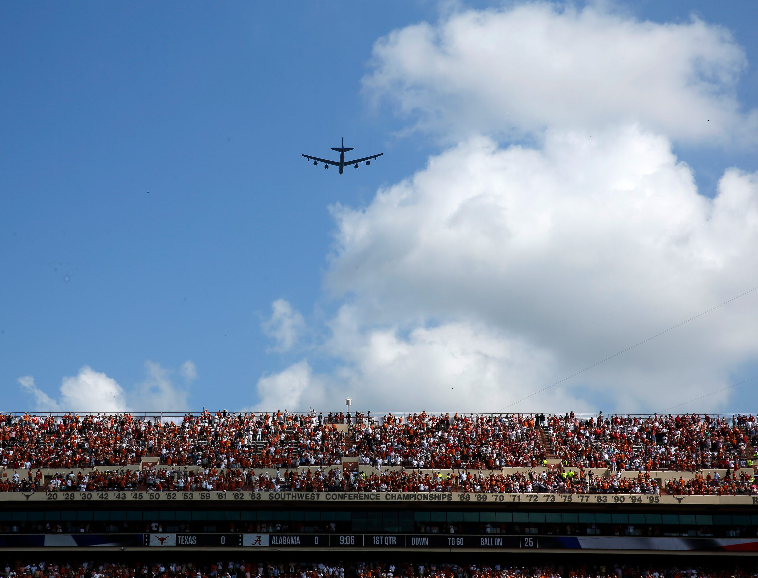 Following the national anthem, a B-52 aircraft out of Barksdale Air Force Base flies down...