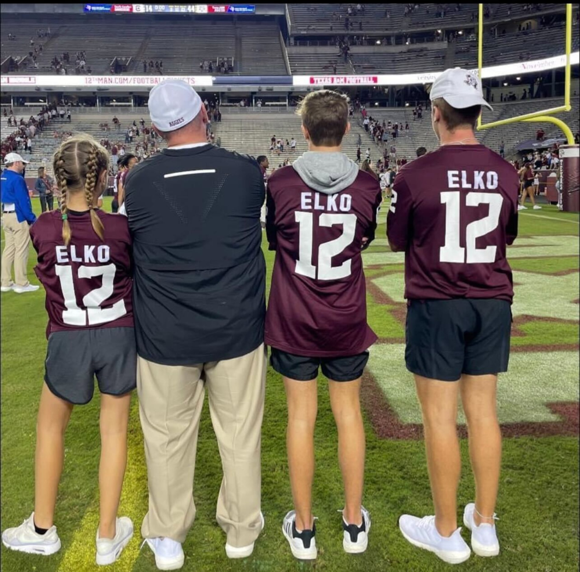 Mike Elko takes in the view at Kyle Field with his daughter Kaitlyn and sons Andrew and...