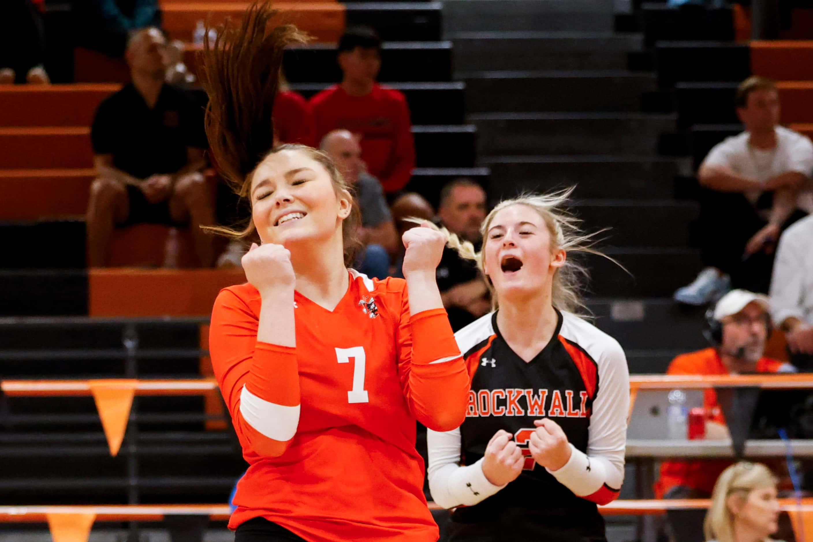 Rockwall high’s Gabi Ashcraft (left) and Sophia Armstrong  cheer after a point against...