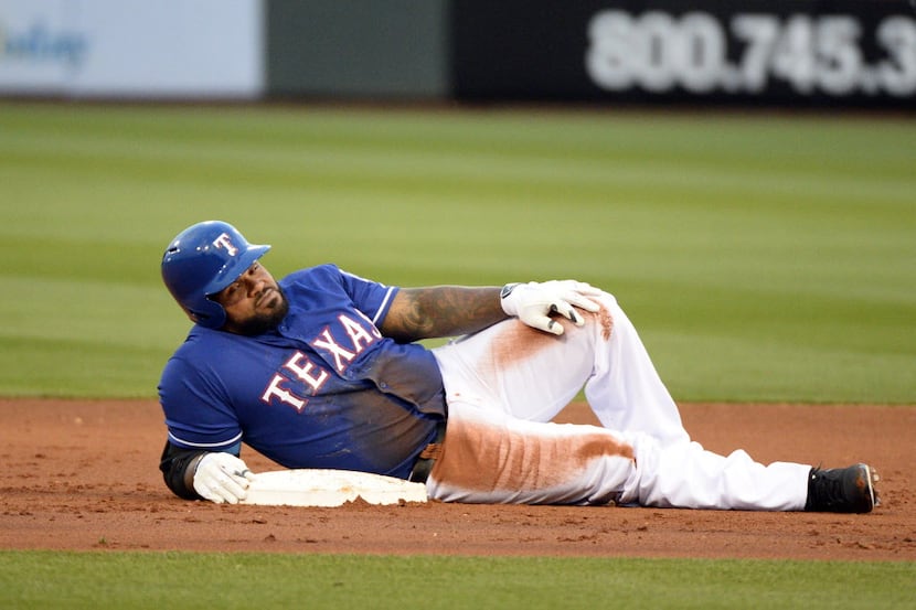 Mar 13, 2014; Surprise, AZ, USA; Texas Rangers first baseman Prince Fielder (84) at second...