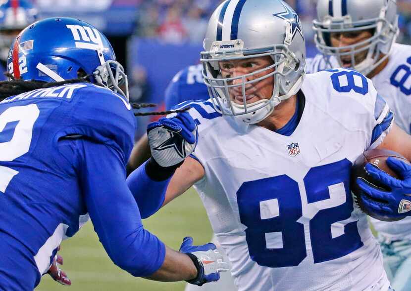 Dallas Cowboys tight end Jason Witten (82) powers into New York Giants strong safety Brandon...