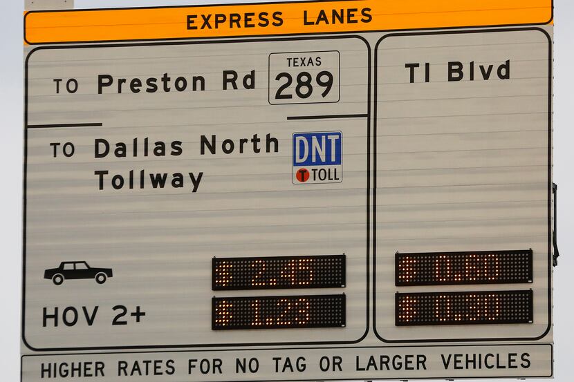 
A new sign post shows the cost for travelers to drive in express lanes of LBJ Freeway...