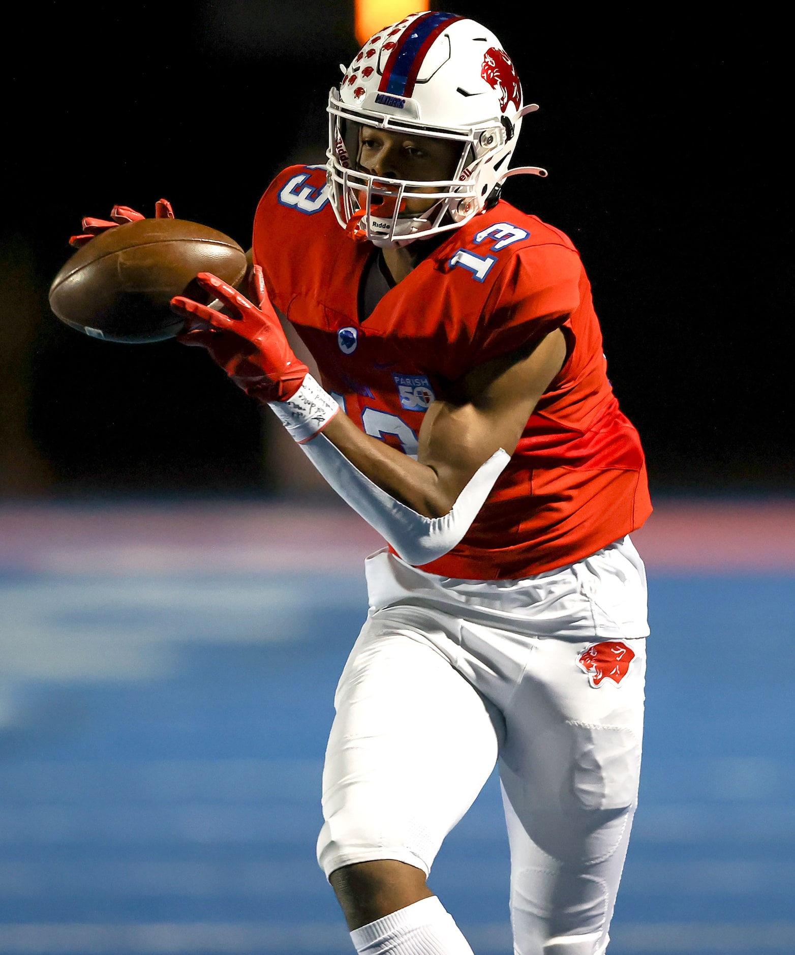 Parish wide receiver Nathaniel Hill comes up with a 37 yard touchdown reception against...