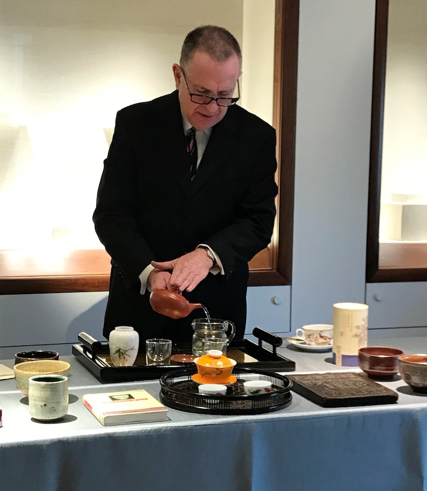 Kyle Stewart of The Cultured Cup talks about tea during a presentation at the Crow...